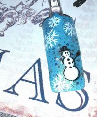 Winter Design mit gemalten Schneeflocken und Schneemann Mustertips