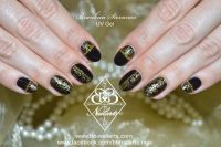 Golden Diva Nailart - schwarz mit goldenen Ornamenten Gelnägel