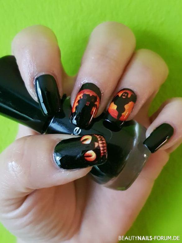 Halloween Nägel mit glühenden Augen und Gespenst Halloween Nägel orange schwarz - Nagellack, selbstgemachte Sticker Nailart