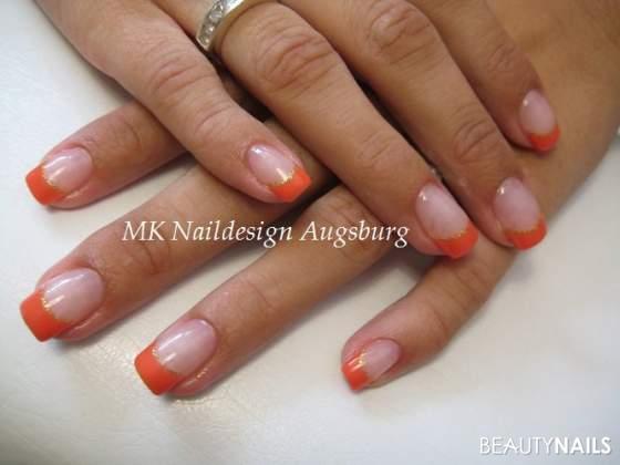 Orange Nageldesign - French tangerine mit goldener Glitzerlinie Nailart