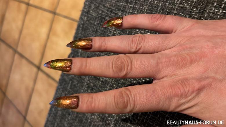 Stiletto nails…Gold metallic