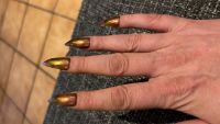 Stiletto nails…Gold metallic Stilettos