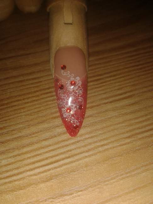 stiletto-tip hab mein püppie wieder gequält ^^ in Anfänger Nageldesign