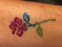 Glitzer Tattoo Rose Angebot für Straßenfest in Marketing